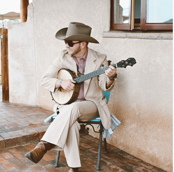 A small thumbnail of Fiddle player Cody Tinnin playing the banjo.