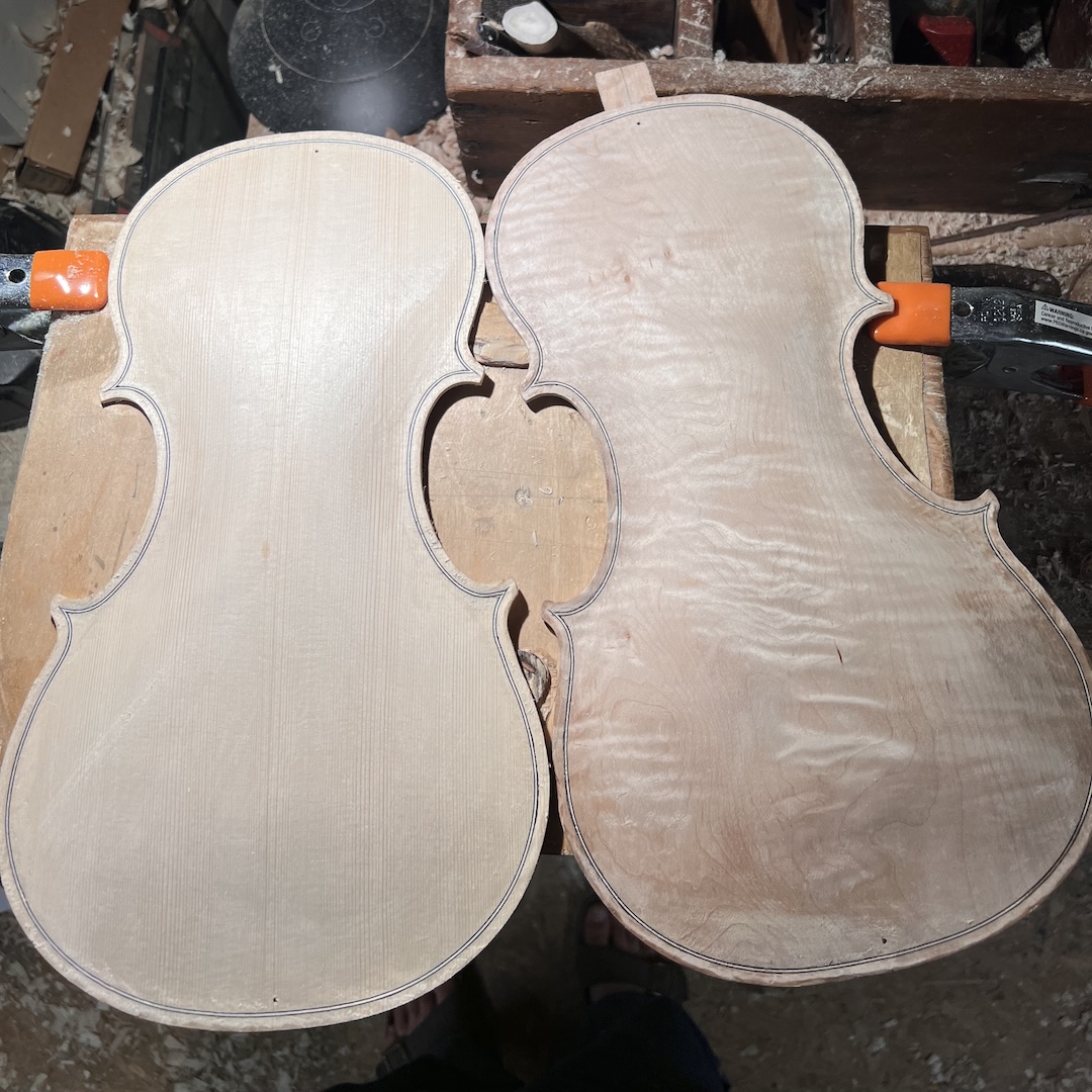 Three of John's instruments, two of which are "in the white."