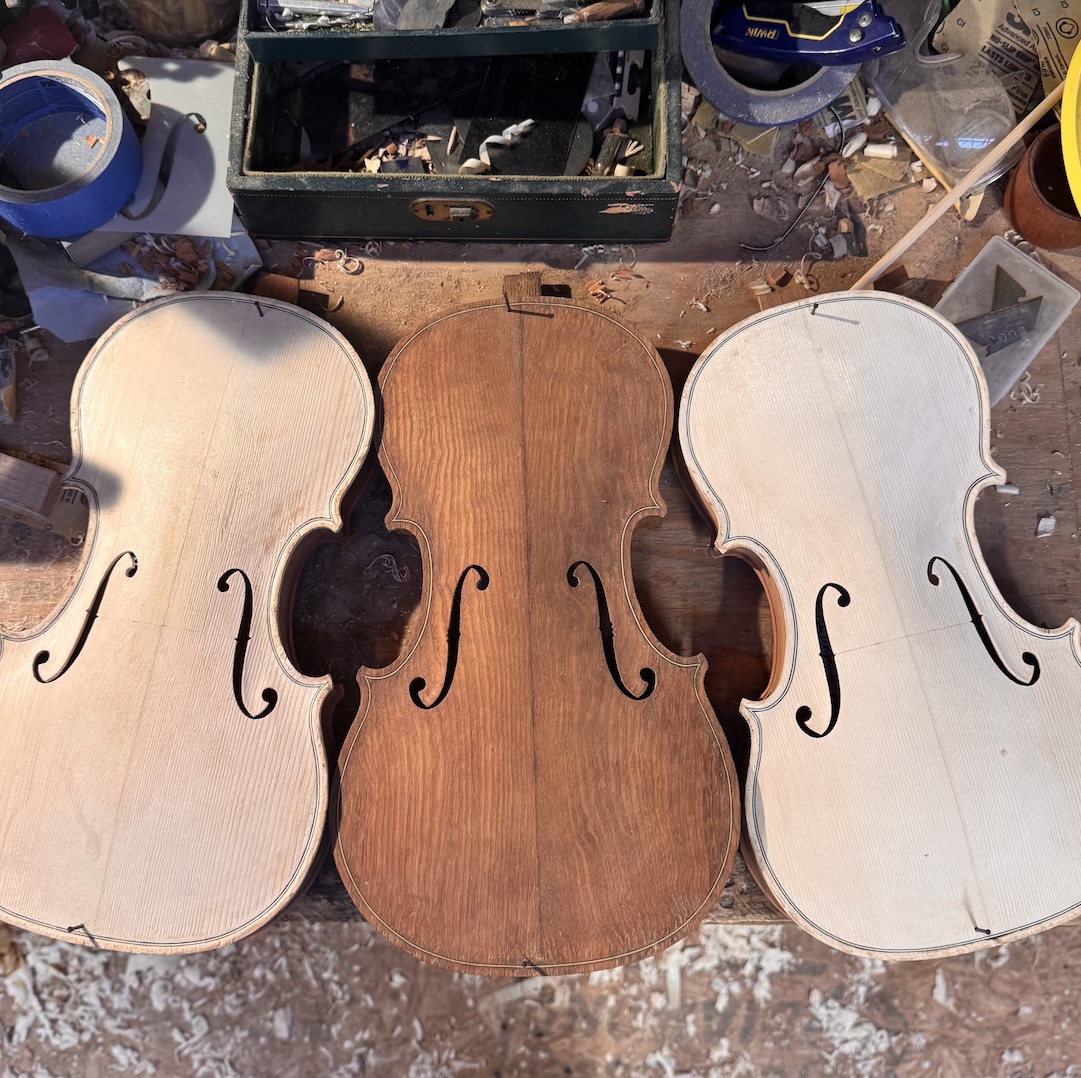 Three of John's instruments at the unvarnished stage, also known as "in the white"