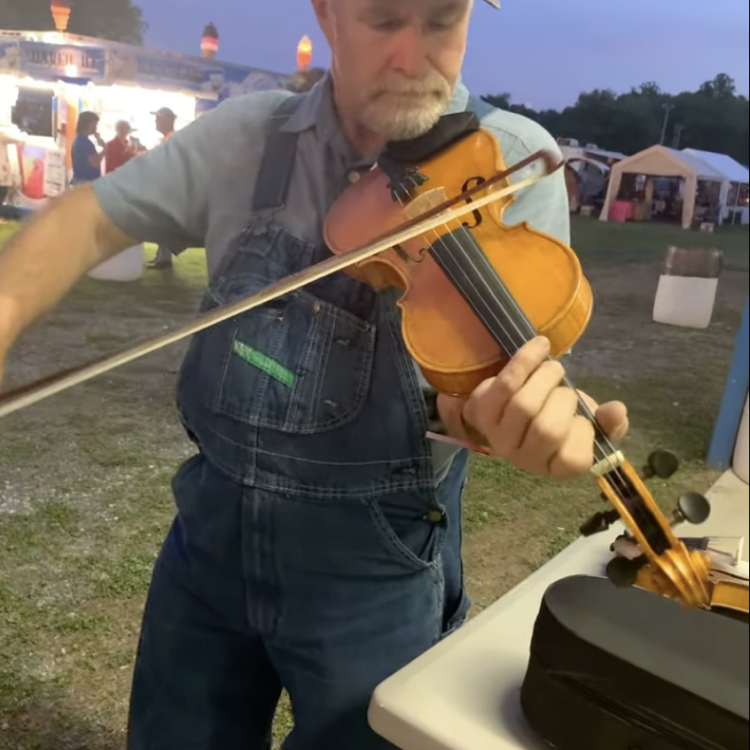 A thumbnail of legendary fiddle player Kirk Sutphin playing John's #8 fiddle.